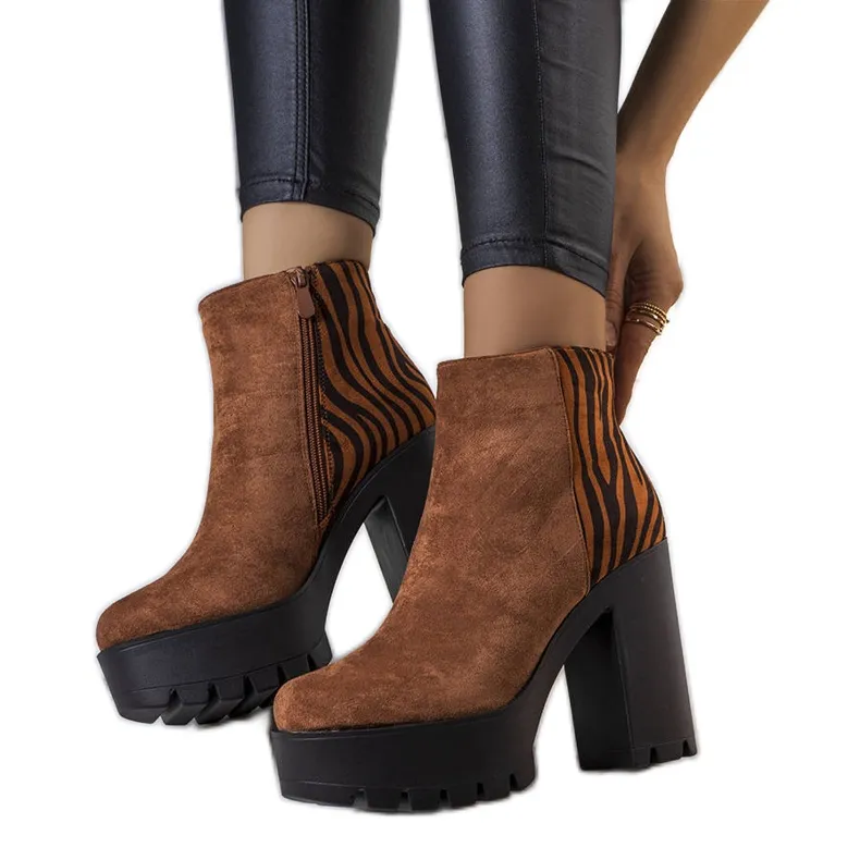 Brown high heel boots from Khalid