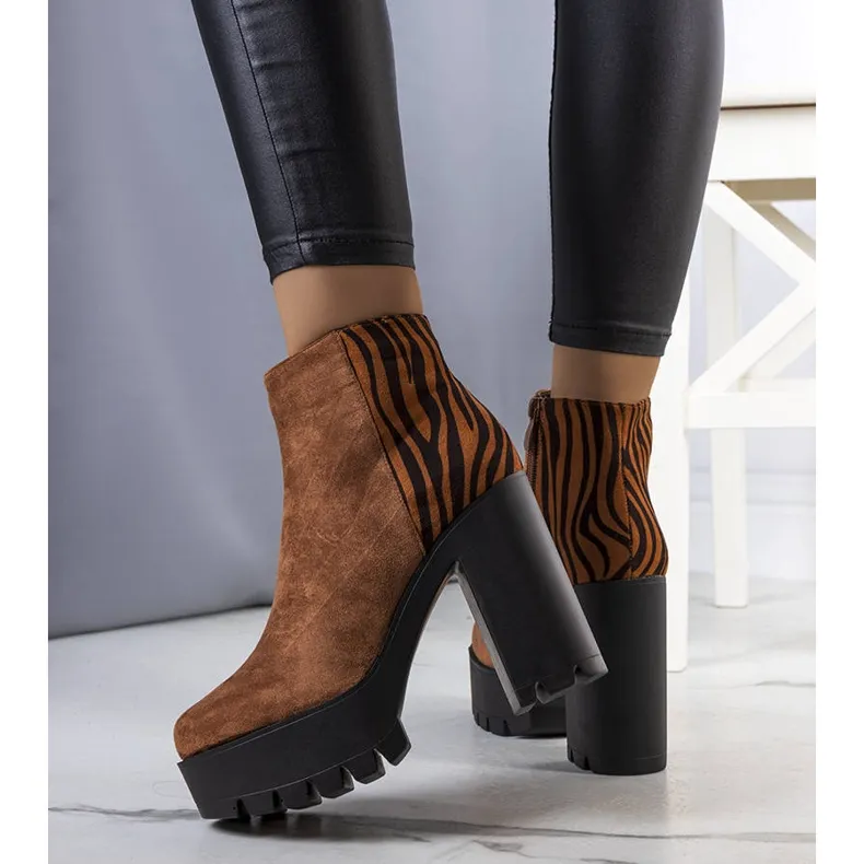 Brown high heel boots from Khalid